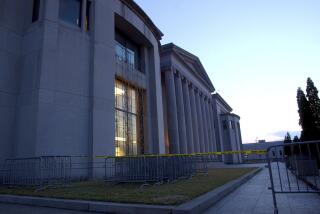 FILE - Police tape and barricades line the plaza of the Alabama Judicial Building in Montgomery, Ala., Wednesday, Sept. 3, 2003. he Alabama Supreme Court has ruled Friday, Feb. 16, 2024, that frozen embryos can be considered children under state law, a ruling critics said could have sweeping implications for fertility treatments. (AP Photo/Dave Martin, File)