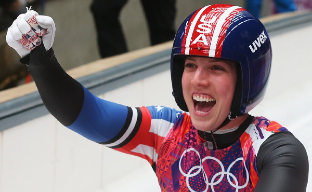 American Erin Hamlin celebrates her bronze-medal finish in luge at the Sochi Winter Olympic Games on Tuesday.