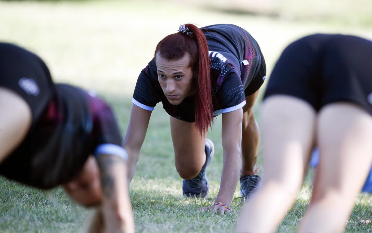 Soccer player Mara Gomez trains with her first division women's soccer team Villa San Carlos, in La Plata, Argentina, Wednesday, Feb. 12, 2020. Gomez is a transgender woman who is limited to only training with her team while she waits for permission to start playing from the Argentina Football Association (AFA). If approved, she would become the first trans woman to compete in a first division, professional Argentine AFA tournament. (AP Photo/Natacha Pisarenko)