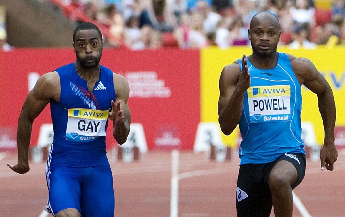 U.S. sprinter Tyson Gay, left, and Jamaica's Asafa Powell confirmed Sunday they have tested positive for banned substances.