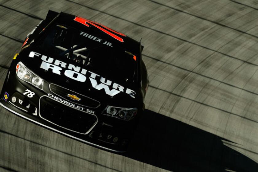 Martin Truex Jr. drives the Furniture Row Chevrolet during a March 14 practice run at Bristol Motor Speedway. Crashes and on-track mishaps are especially tolling for one-car teams trying to compete in NASCAR's top category.