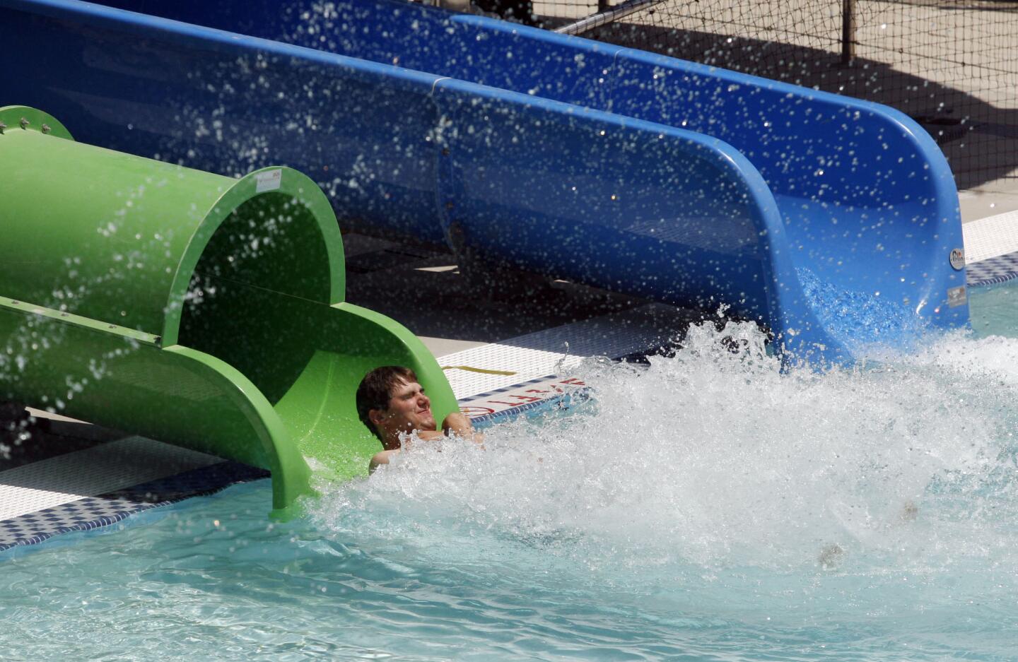 Richard Nigra tries out the water slides at Verdugo Aquatic Center pool in Burbank on Wednesday, May 22, 2013. The pool was remodeled into an olympic size pool and an activity pool with slides was also added to the pool area. The pool will open soon.