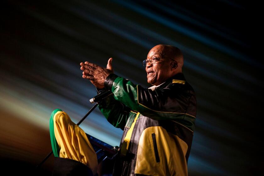 South Africa's President Jacob Zuma gestures during celebrations for his 75th birthday on April 12, 2017 in Kliptown, Soweto. Rival South African opposition parties joined forces on April 12 when tens of thousands of demonstrators marched through the capital Pretoria calling for President Jacob Zuma to resign, AS Zuma's recent sacking of respected finance minister Pravin Gordhan has fanned years of public anger over government corruption scandals, record unemployment and slowing economic growth. / AFP PHOTO / John WESSELSJOHN WESSELS/AFP/Getty Images ** OUTS - ELSENT, FPG, CM - OUTS * NM, PH, VA if sourced by CT, LA or MoD **