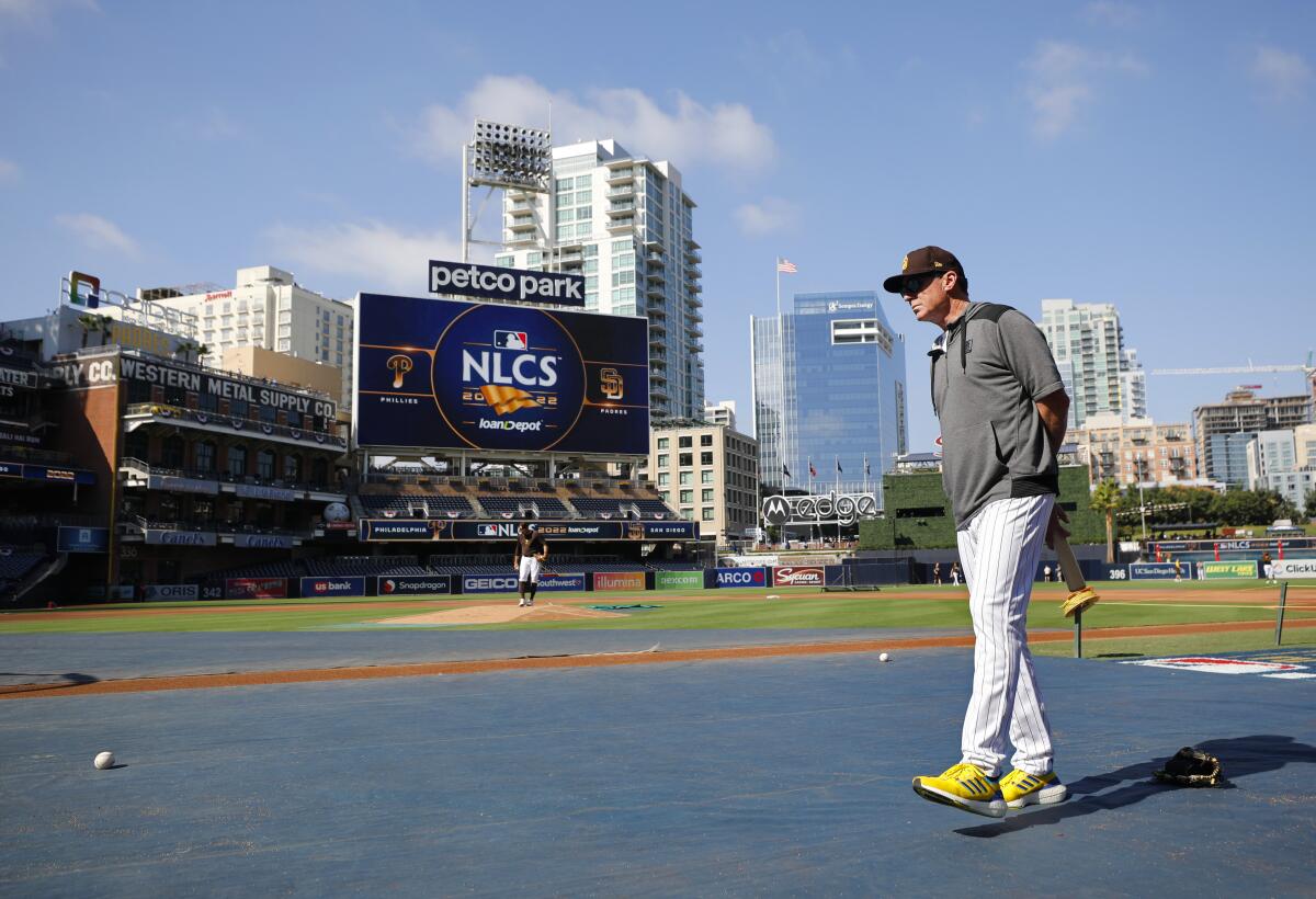 Padres manager Bob Melvin watches a workout Monday at Petco Park.