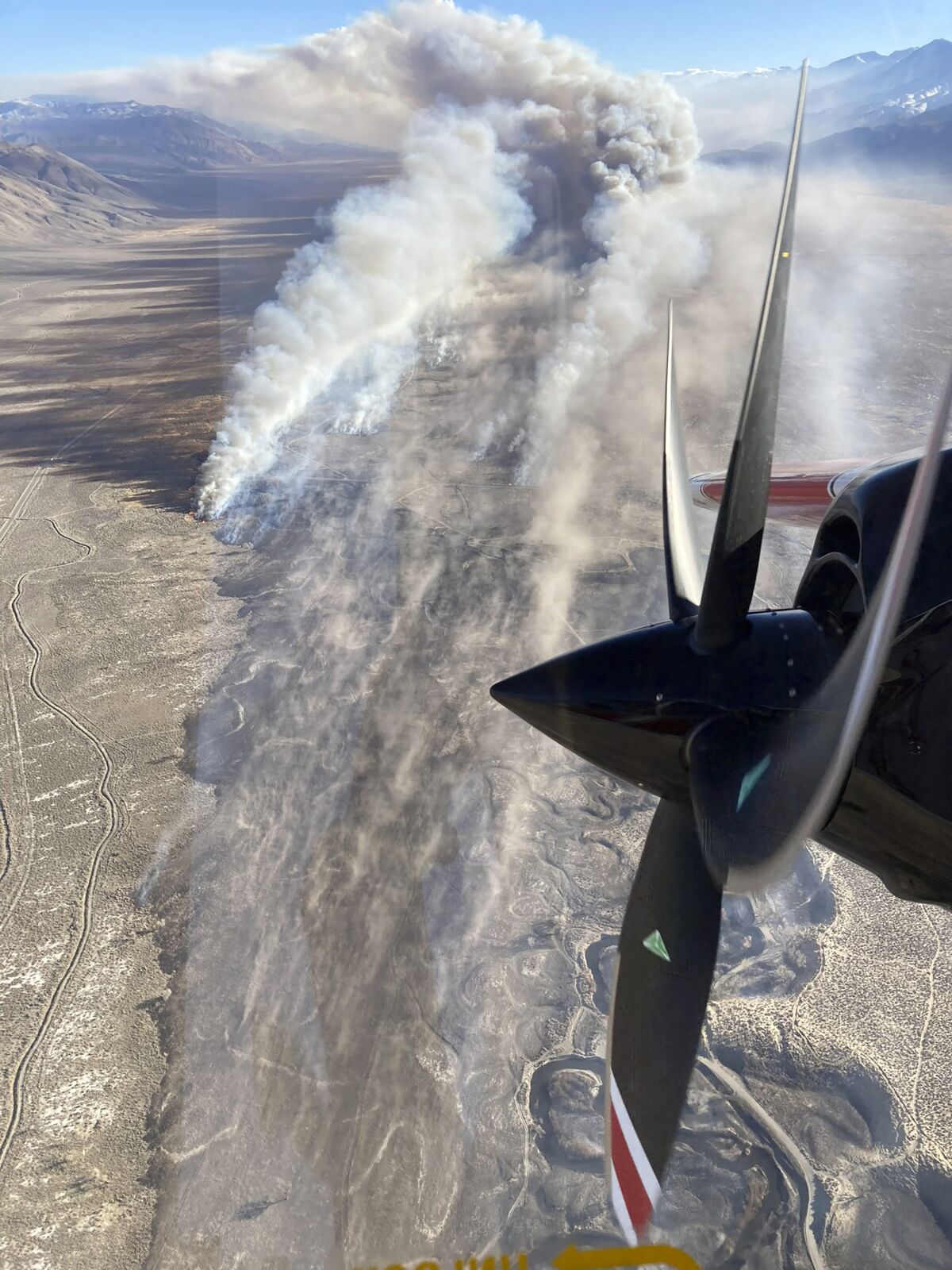 The Airport fire burns east of Bishop, Calif., in the Owens Valley