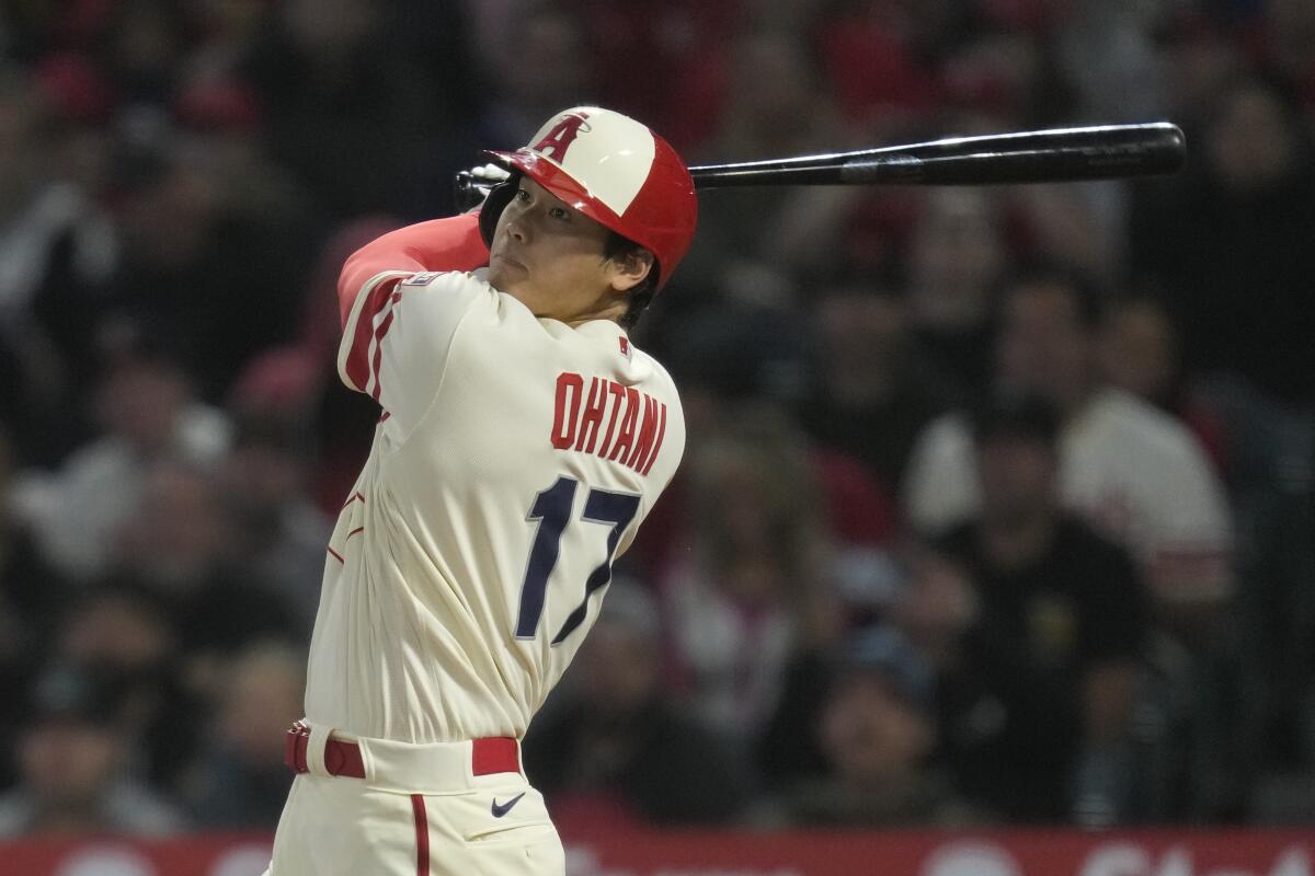 Angels' Shohei Ohtani singles during the fourth inning against the Washington Nationals at Angel Stadium.