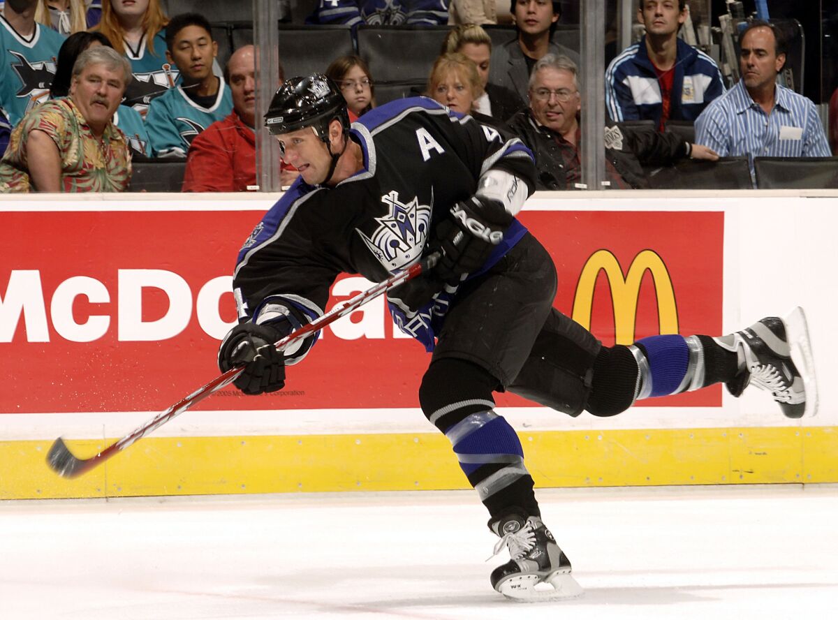 Former Kings defenseman Rob Blake fires a shot on goal in 2006. Blake's number will be retired by the Kings franchise on Saturday.
