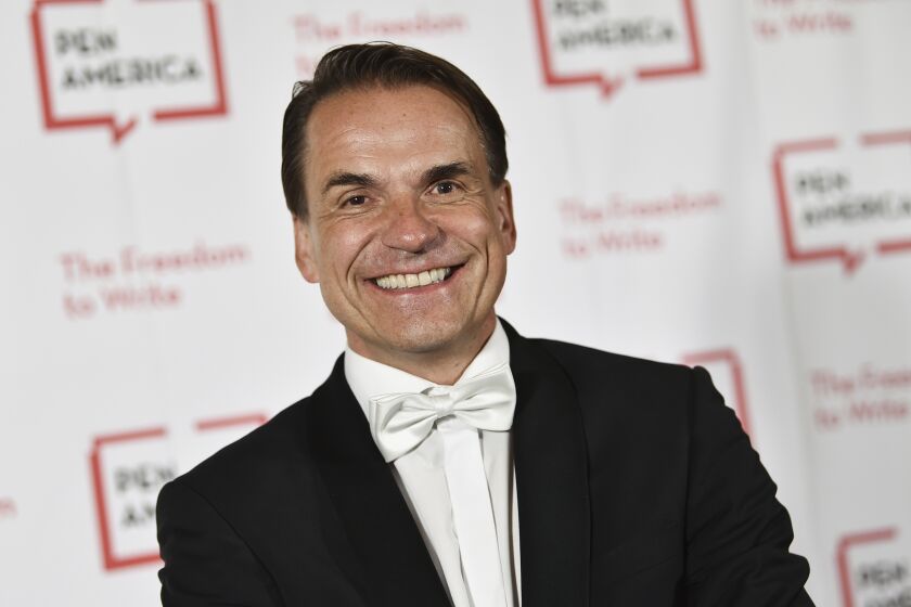FILE - Penguin Random House CEO Markus Dohle attends the 2018 PEN Literary Gala at the American Museum of Natural History on Tuesday, May 22, 2018, in New York. Dohle is stepping down, effective at the end of the year. It comes just weeks after a federal judge blocked the company’s attempt to buy rival Simon & Schuster. Dohle is also leaving his seat on the Bertelsmann executive board. (Photo by Evan Agostini/Invision/AP, File)