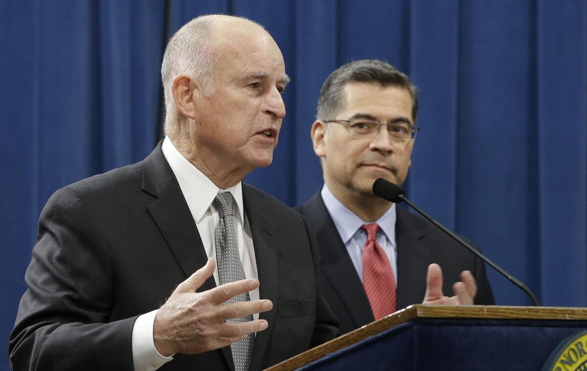 Gov. Jerry Brown, accompanied by California Atty. Gen. Xavier Becerra, responds to remarks made by U.S. Atty. Gen. Jeff Sessions in Sacramento.