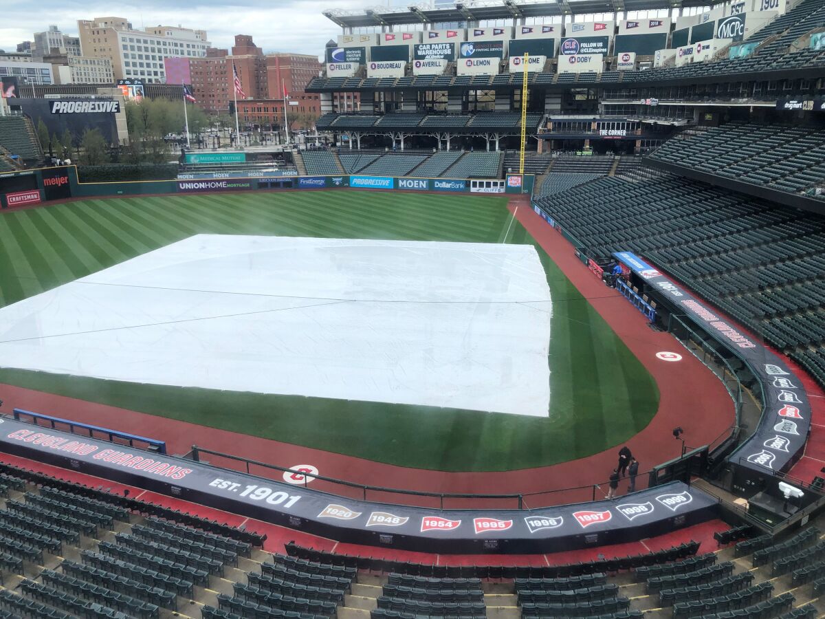 The tarp remained on the infield at Progressive Field in Cleveland on Tuesday.