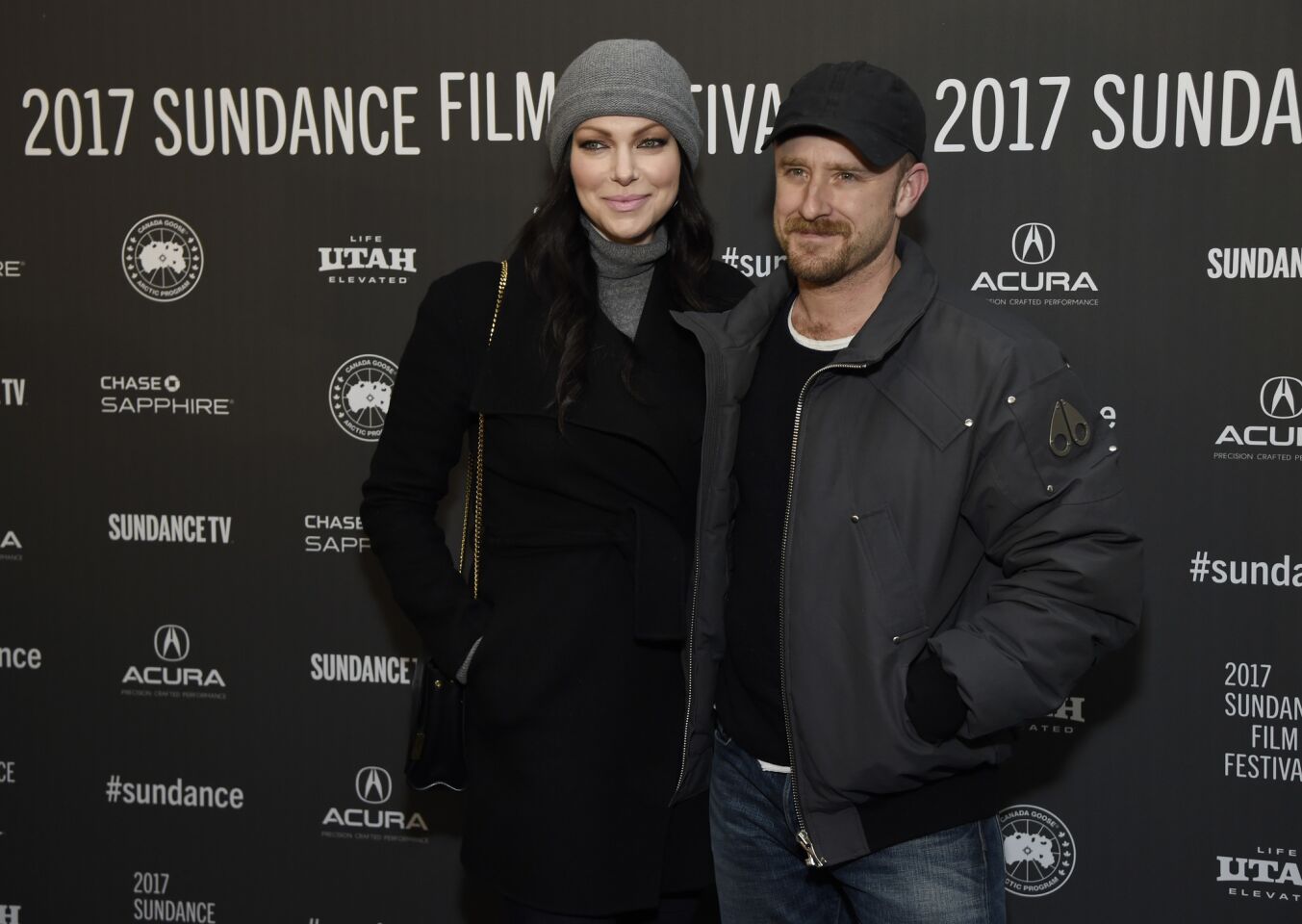 Laura Prepon, left, a cast member in "The Hero," with her fiancé, actor Ben Foster, at the premiere of the film at the Library Center Theatre.