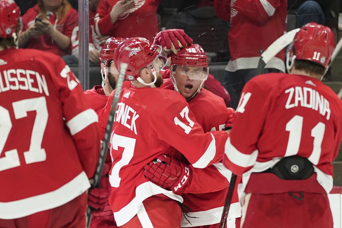 Detroit Red Wings left wing Jakub Vrana (15) celebrates his goal against the Arizona Coyotes in the second period of an NHL hockey game Tuesday, March 8, 2022, in Detroit. (AP Photo/Paul Sancya)