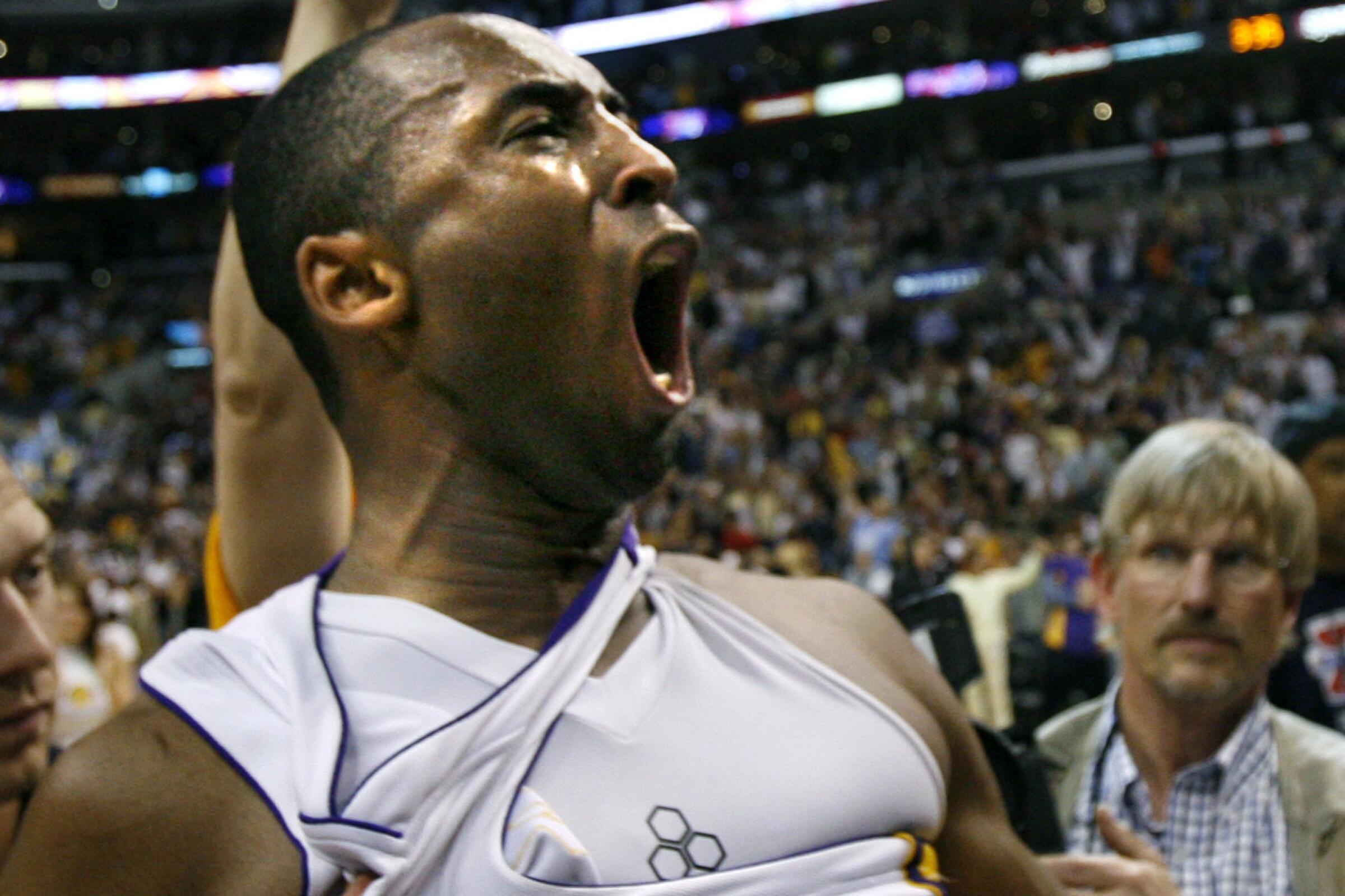 Kobe Bryant reacts after making the winning shot against the Phoenix Suns in Game 4 of a 2006 first-round playoff series at Staples Center.