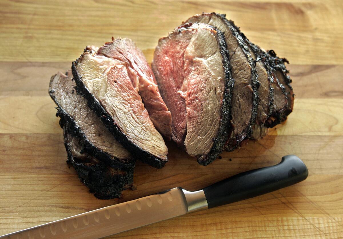 SEARED: A grilled leg of lamb gets an infusion of ethnic finesse with a marinade of yogurt and Indian spices.