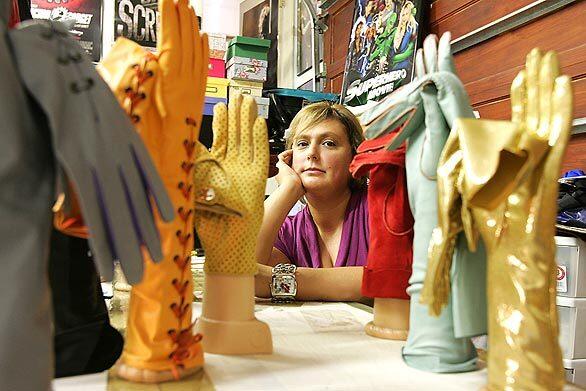 Dorothy Gaspar, a third-generation glove maker from Hungary, with some of the gloves she has made in her home studio. She makes gloves for individuals and for high-profile period movies such as "The Changeling" and "The Spirit." Im always trying to come up with new, edgy designs, Gaspar says.