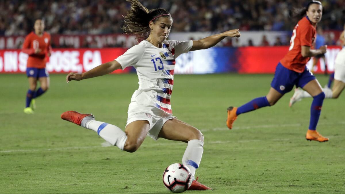 Alex Morgan of the U.S. takes a shot during an Aug. 31 game against Chile.