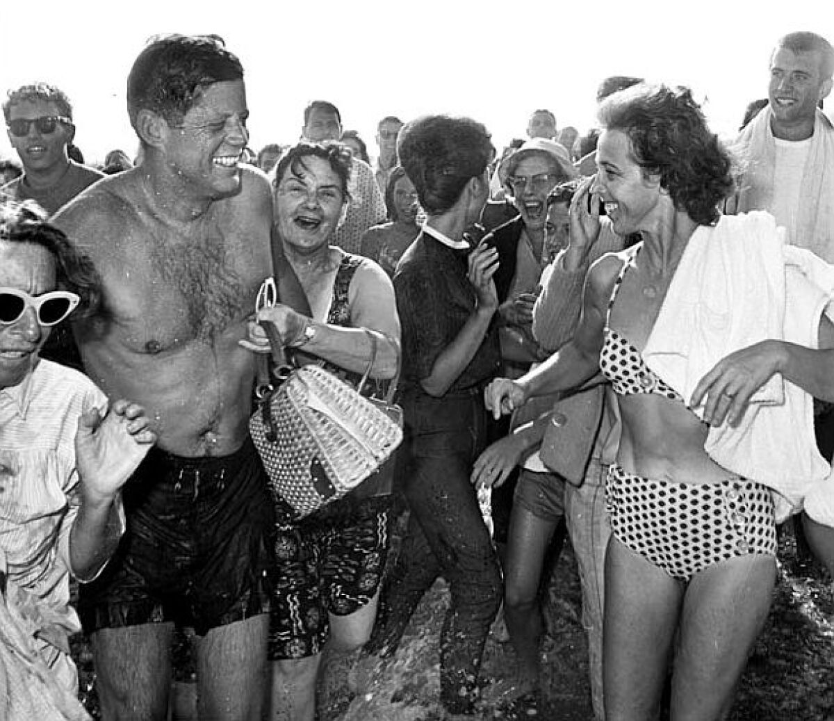 President Kennedy in an iconic beach photo taken by Times photographer Bill Beebe in 1962.