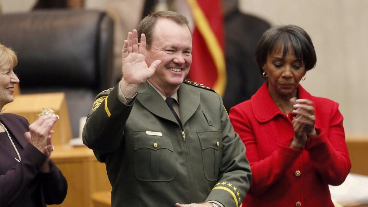 The court battle over the list of sheriff’s deputies came as L.A. County Dist. Atty. Jackie Lacey, right, who supported McDonnell in his election, has redefined how her office would handle the names of problem officers.