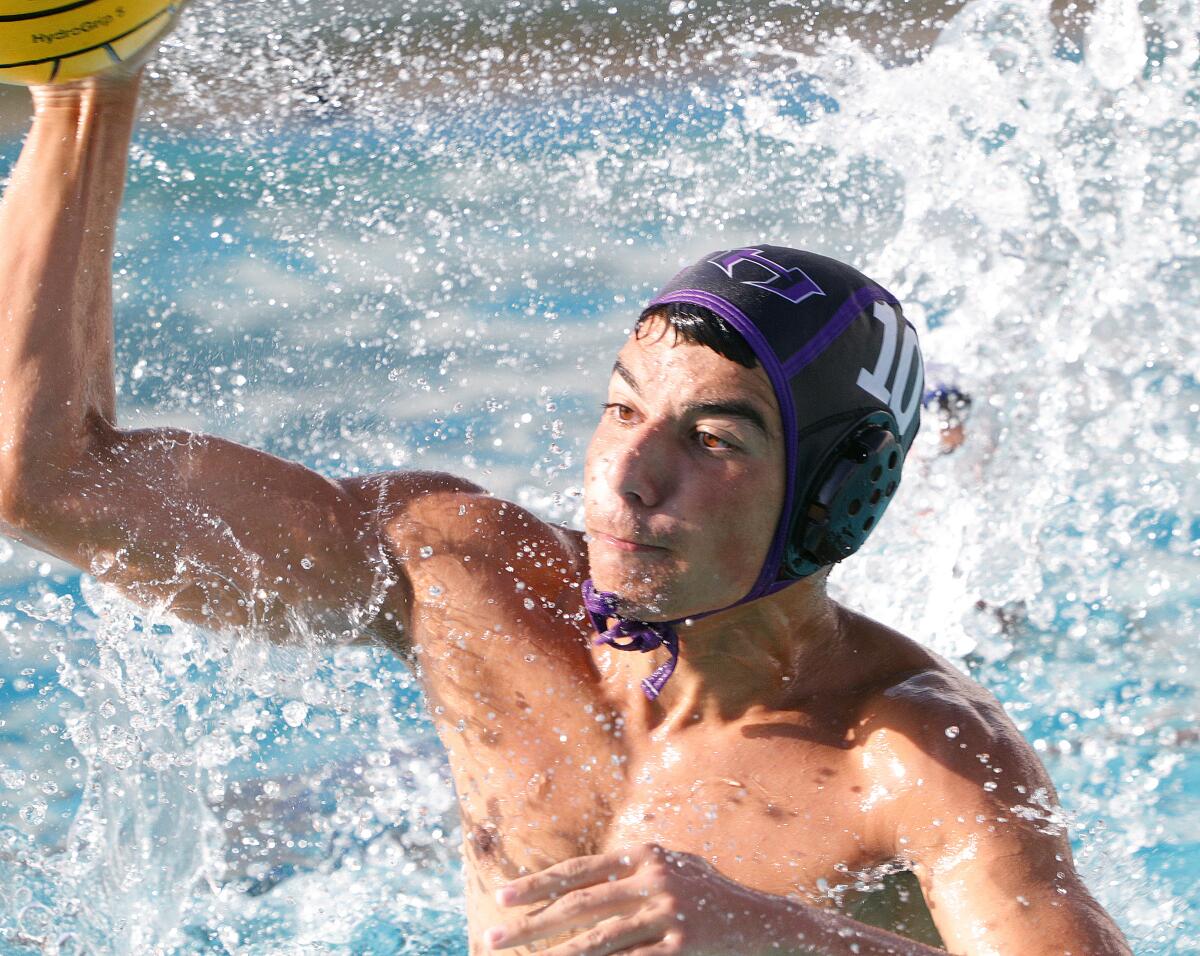 Hoover's Samvel Manukyan gets in close to shoot against Burbank in a Pacific League boys' water polo match at Hoover High School on Thursday, October 10, 2019. Hoover won the match.