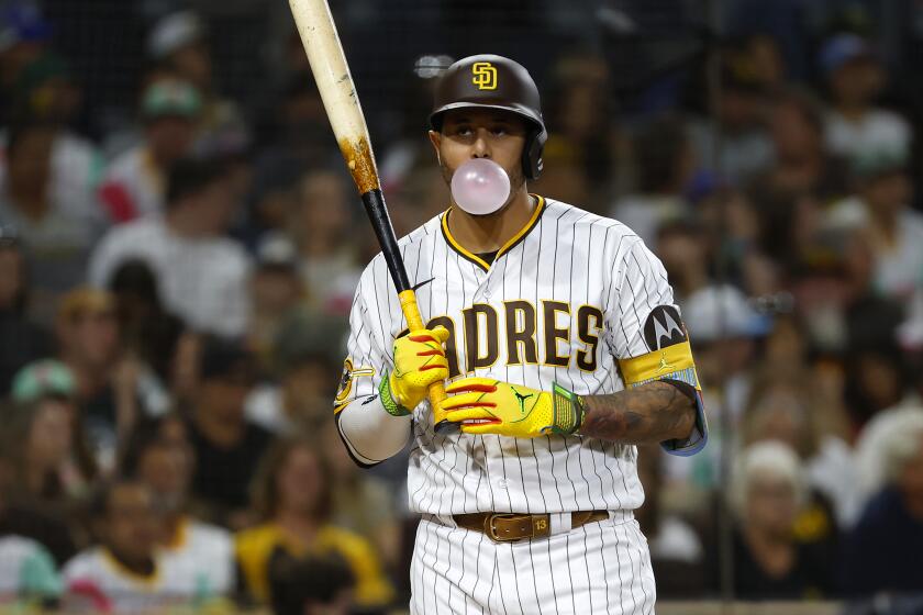 San Diego, CA, September 18, 2023: San Diego Padres' Manny Machado blows a bubble waiting to bat against the Colorado Rockies at Petco Park on Monday, September 18, 2023. (K.C. Alfred / The San Diego Union-Tribune)