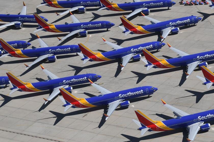 (FILES) In this file photo taken on March 28, 2019 Southwest Airlines Boeing 737 MAX aircraft are parked on the tarmac after being grounded, at the Southern California Logistics Airport in Victorville, California. - Boeing reported lower first-quarter profits on April 24, 2019, as the global grounding of its 737 MAX plane following two crashes hit results. The US aerospace giant reported $2.1 billion in profits, down 13.2 percent from same period a year ago. Boeing also withdrew its full-year profit forecast due to uncertainty surrounding the 737 MAX. (Photo by Mark RALSTON / AFP)MARK RALSTON/AFP/Getty Images ** OUTS - ELSENT, FPG, CM - OUTS * NM, PH, VA if sourced by CT, LA or MoD **