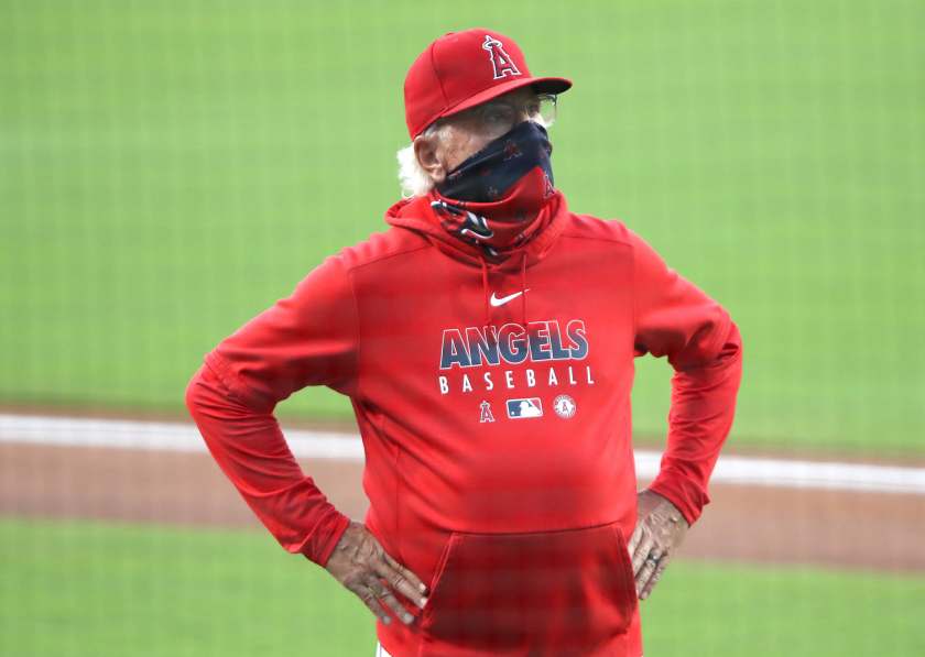 Angels manager Joe Maddon looks on during a game against the San Diego Padres in September.