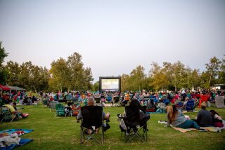 Movie-goers enjoying the screening of The Sandlot at Yorba Regional Park in 2021.
