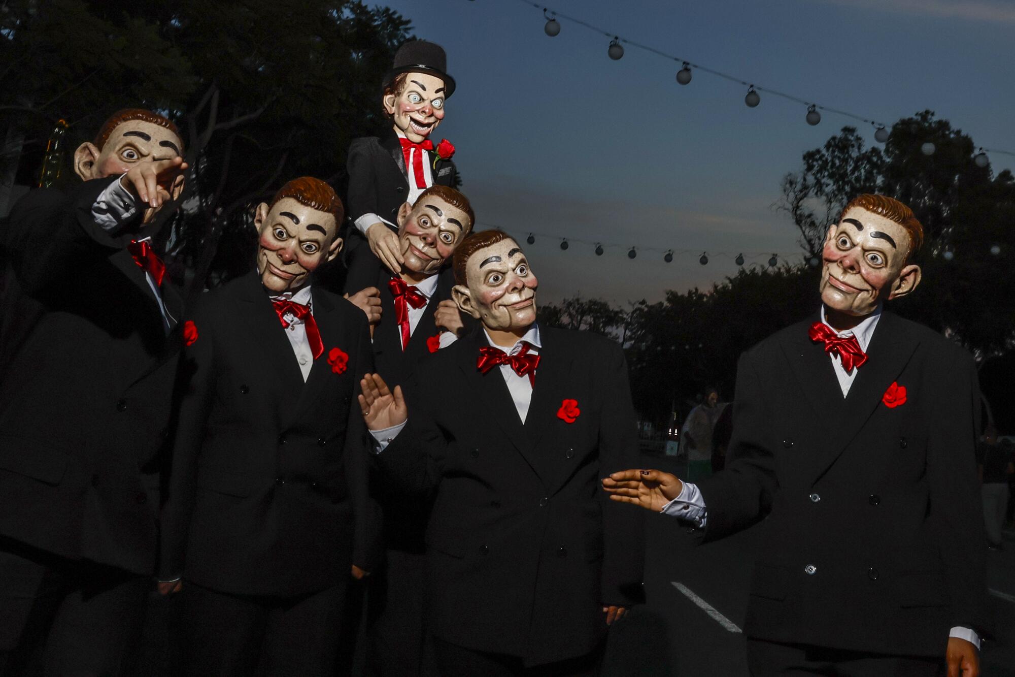 A gaggle of "Slappy" dummies parades along Santa Monica Boulevard in support of R.L. Stine's "Goosebumps" series.
