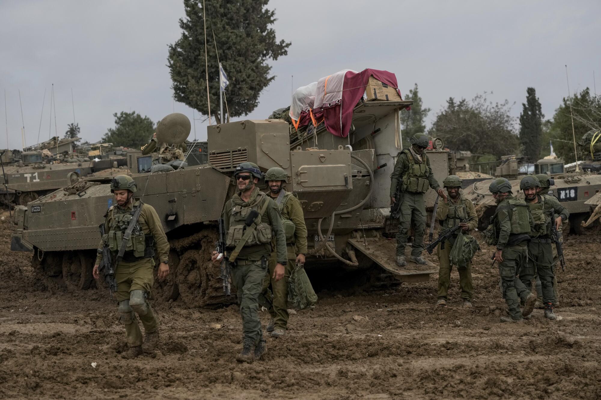 Israeli soldiers at a staging area near the Israeli-Gaza border