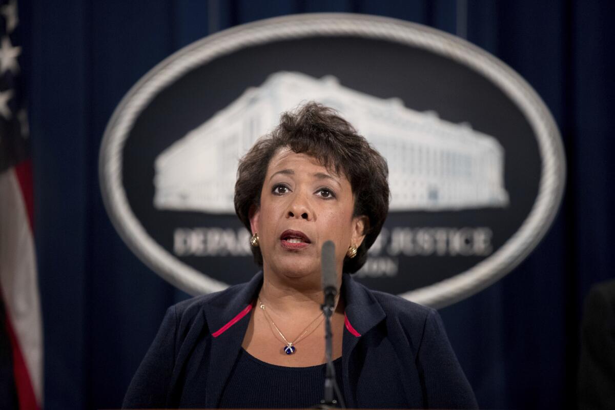Atty. Gen. Loretta Lynch speaks at a news conference at the Justice Department in Washington on Sept. 22.