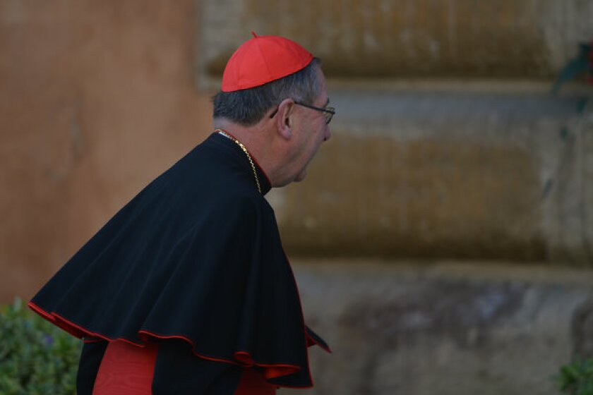 Cardinal Roger Mahony arrives at the Vatican for talks ahead of a conclave to elect a new pope.