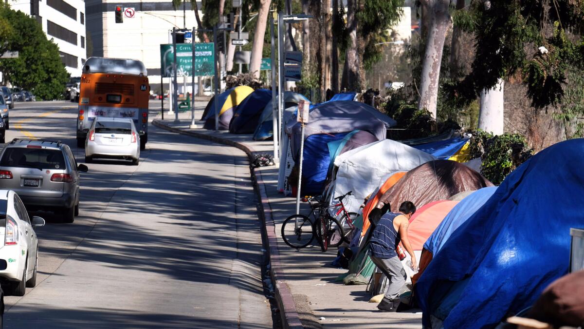 Tents from a homeless encampment line a street in downtown Los Angeles in January. The Los Angeles City Council is asking voters to pass a $1.2 billion bond measure to fight homelessness this fall.