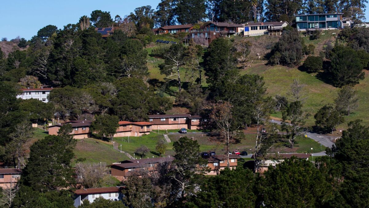 More expensive homes overlook the former on-campus housing at the Golden Gate Baptist Theological Seminary in Marin County. A developer wants to renovate those homes and build new ones, but the county denied its plans.