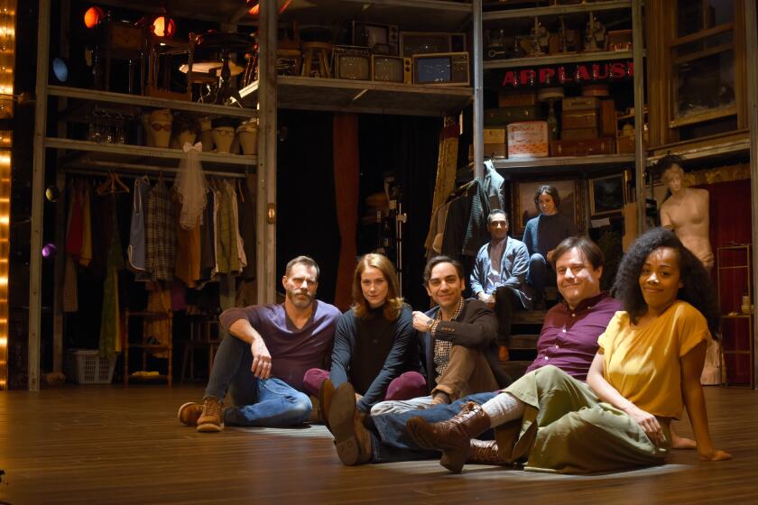 MANHATTAN, NEW YORK, FEBRUARY 20, 2019 The cast and director of the Broadway show Merrily We Roll Along is seen on stage at the Harold and Miriam Steinberg enter for Theater, in the Laura Pels Theater, in Manhattan, NY. Director Noah Brody, with beard and purple sweater, is seen with Manu Narayan, in gray suit jacket, Emily Young, in gray sweater and hair back, Ben Steinfeld, in navy jacket, Jessie Austrian, with red hair, Brittany Bradford, in yellow shirt, and Paul Coffey, with beard and purple button down shirt. 2/20/2019 Photo by Jennifer S. Altman/For The Times