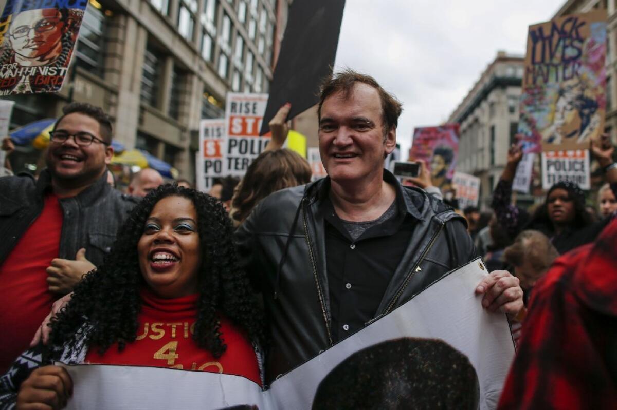Quentin Tarantino marches in the Oct. 24 rally protesting police brutality.