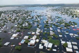 In this image made from video, flooded streets are seen from the air in the town of Beledweyne, in Somalia, Sunday, Nov. 19, 2023. First, some families fled drought and violence. Now they say they have nowhere to hide from intense flooding as rainfall exacerbated by the weather phenomenon El Nino pummels large parts of Somalia. (AP Photo)