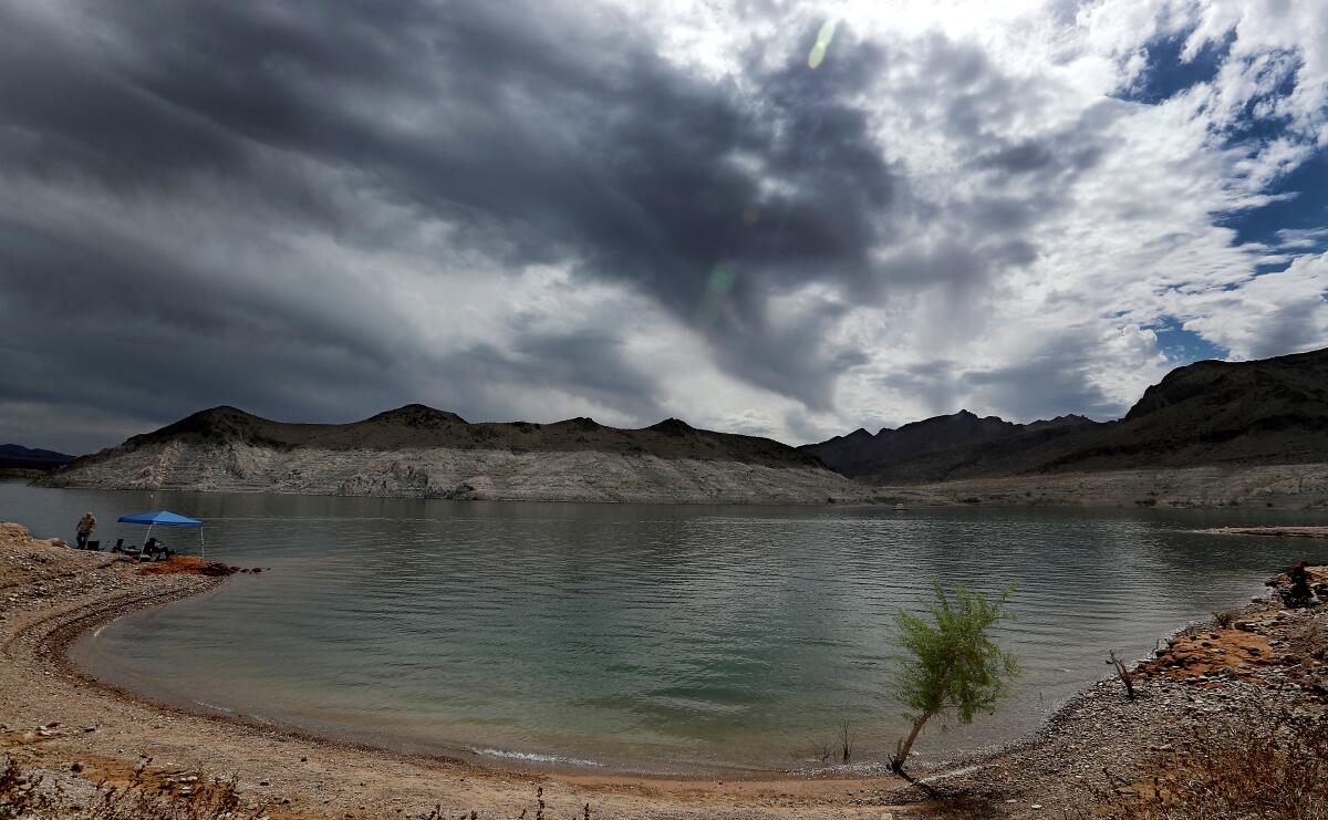 A "bathtub ring" around Lake Mead in 2021 shows how low water levels have dropped at the  reservoir because of the drought