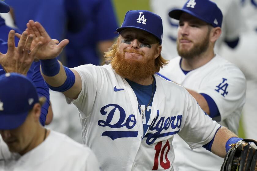 Los Angeles Dodgers third baseman Justin Turner celebrates their win against the Atlanta Braves.