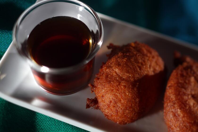 Sweet potato fritters with clove-scented syrup