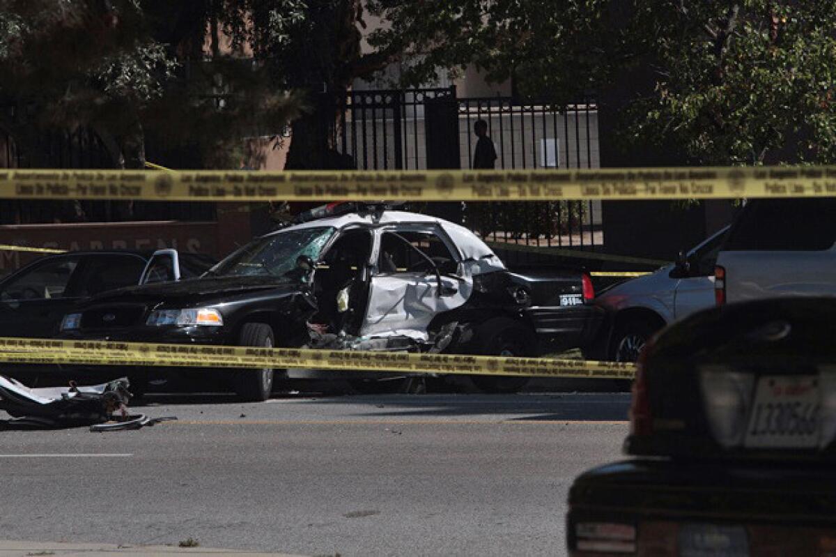 The LAPD cruiser struck by a hit-and-run driver in Harbor City, killing an officer and seriously injuring another.