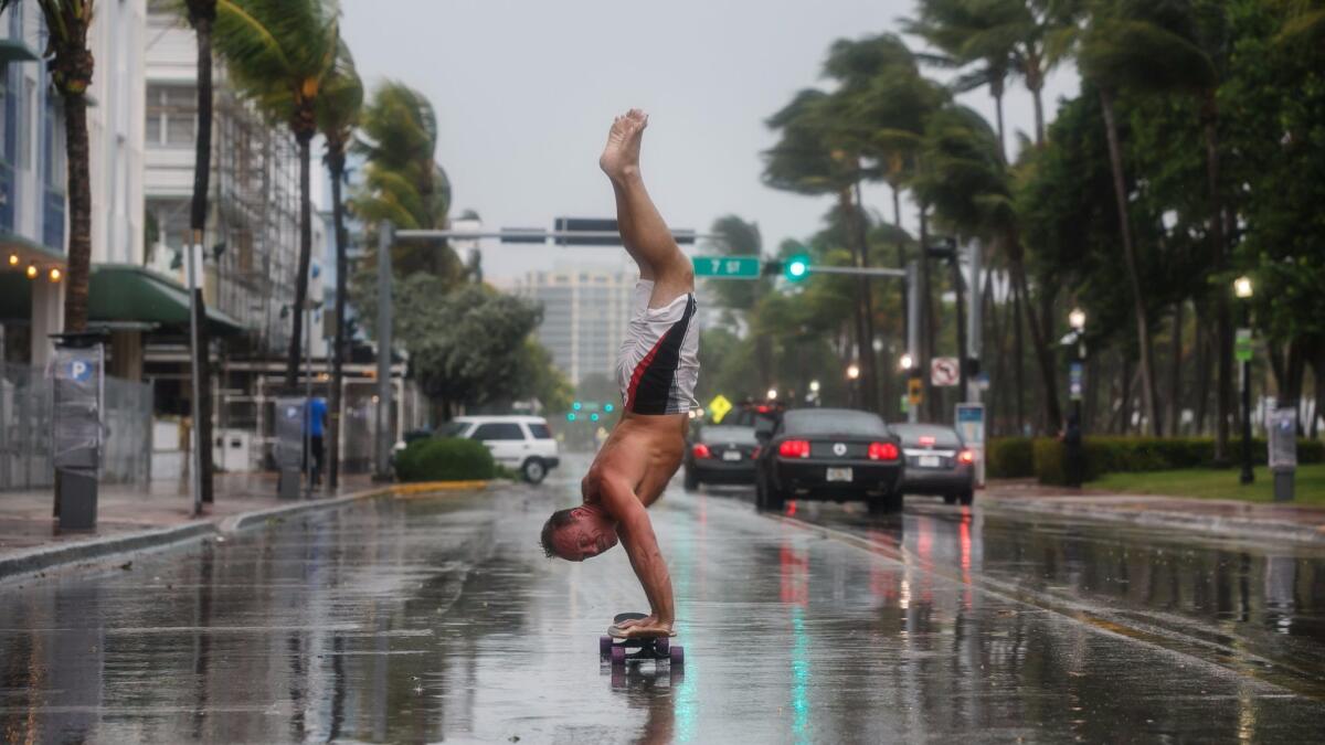 Adam Todd takes advantage of a largely deserted Ocean Drive in Miami Beach as Hurricane Irma barreled toward Florida on Saturday.