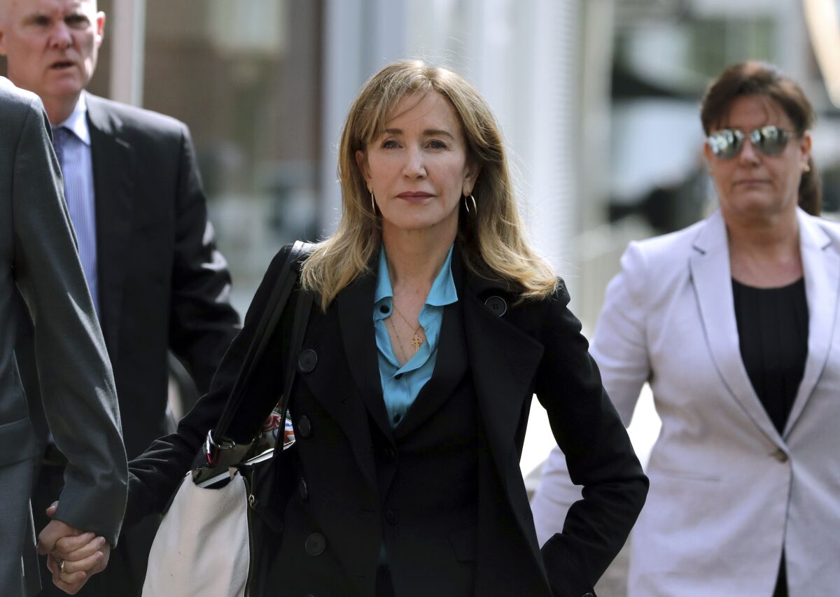 Actress Felicity Huffman arrives at federal court in Boston on April 3.
