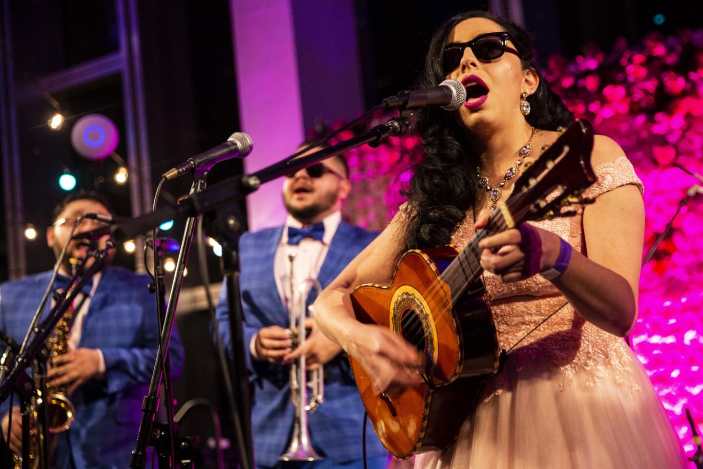 Nancy Sanchez, right, performs at Sleepless: The Music Center After Hours' "Quinceañera Reimagined" at the Dorothy Chandler Pavilion on Feb. 10, 2019, in Los Angeles.