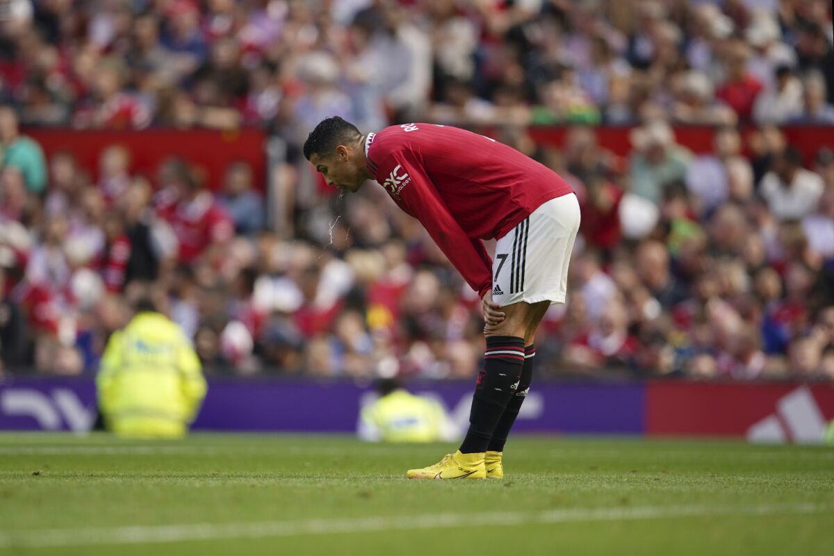 Manchester United's Cristiano Ronaldo stands during the English Premier League soccer match between Manchester United and Brighton at Old Trafford stadium in Manchester, England, Sunday, Aug. 7, 2022. (AP Photo/Dave Thompson)