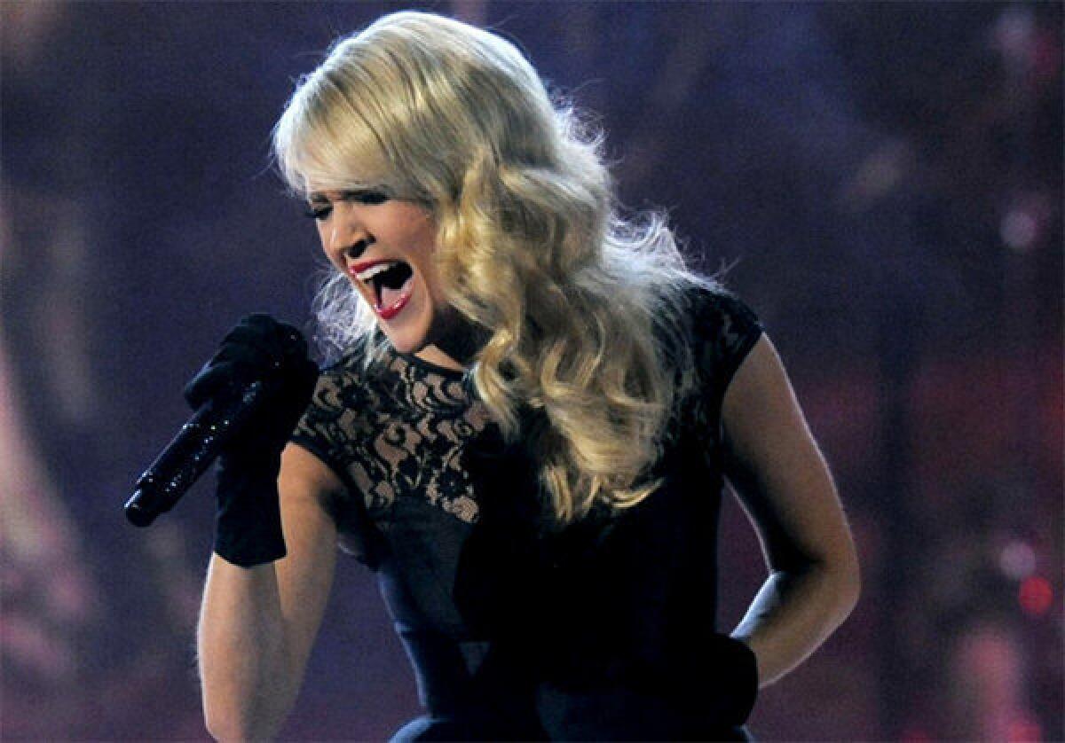 Carrie Underwood has been chosen to perform the opening theme for "Sunday Night Football," replacing Faith Hill.