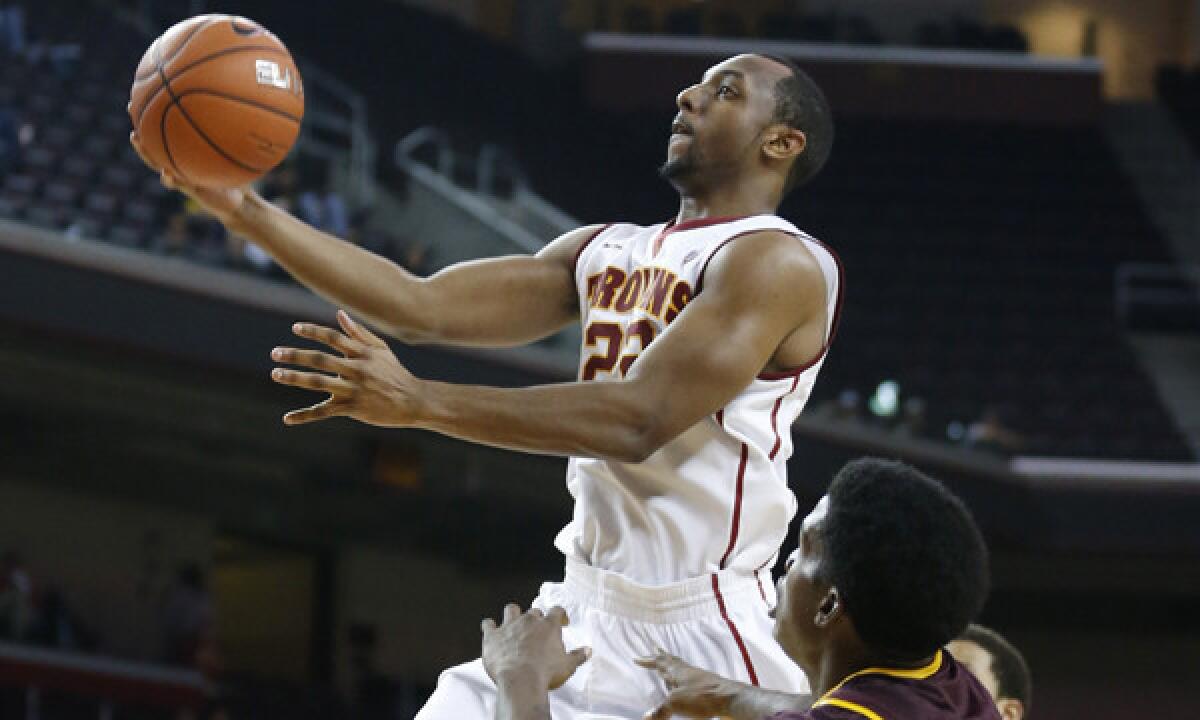 USC's Byron Wesley puts up a shot during a game against Arizona State on Jan. 9. Wesley did not travel with the Trojans during their recent road trip because an unspecified violation of team rules.