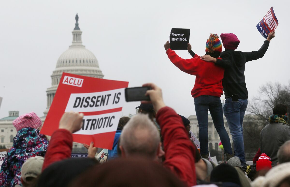 Hundreds of thousands of women gathered on the National Mall for a protest Saturday.