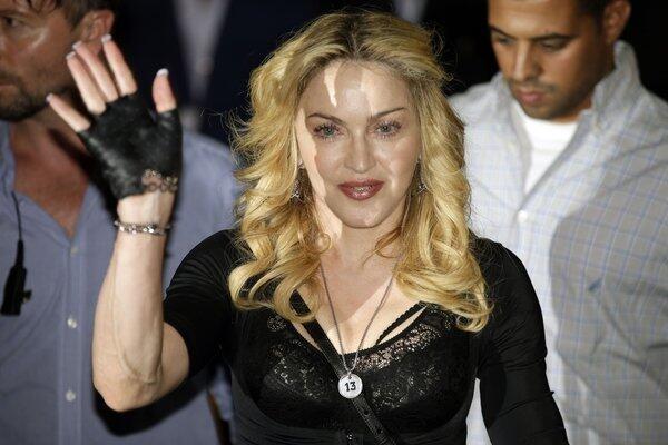 The pop star grossed approximately $125 million between June 2012 and June 2013, beating Oprah Winfrey, last year's money-making queen. A powerhouse Super Bowl performance and wildly popular tour pushed Madonna ahead of director Steven Spielberg, who clocked in second with $100 million.