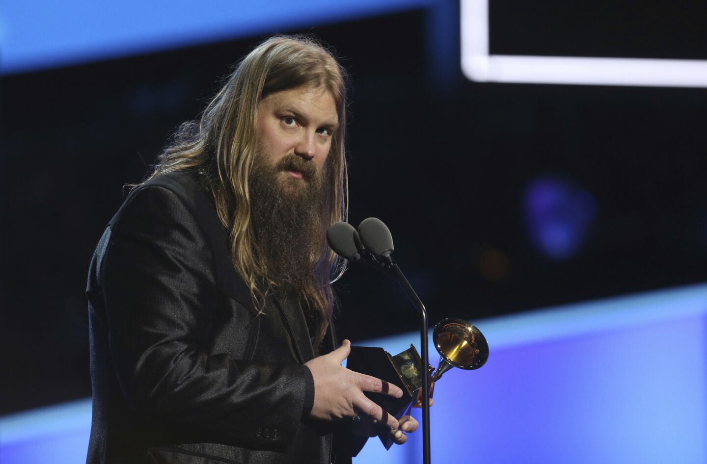 Chris Stapleton accepts the country solo performance award for "Either Way" at the pre-telecast show.