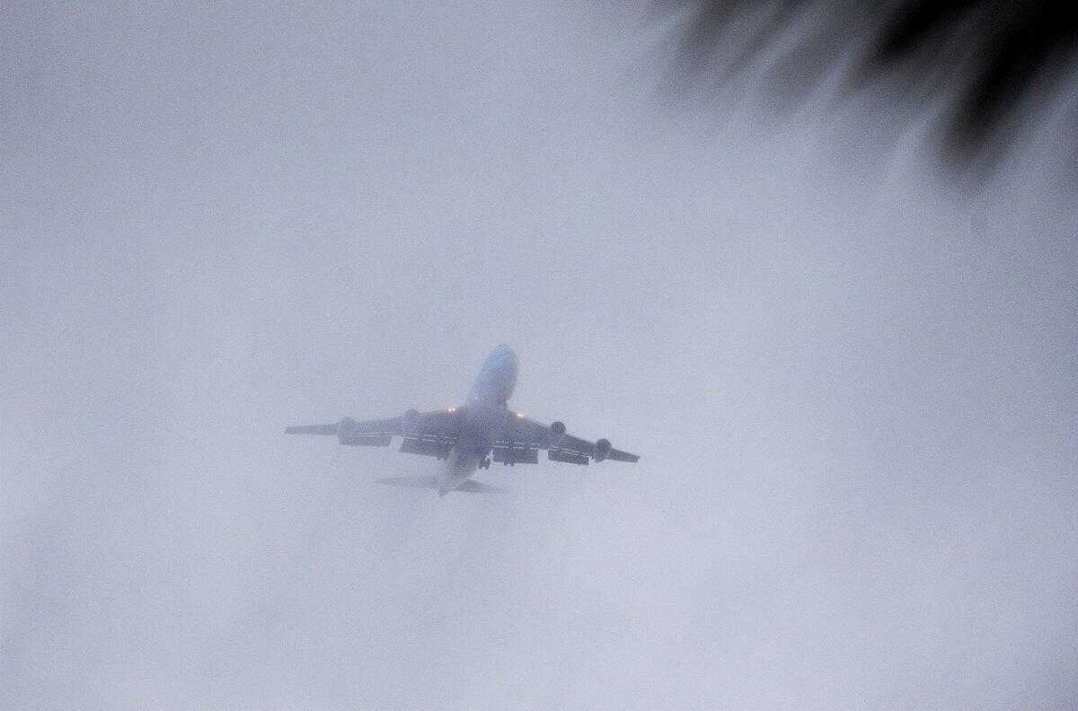 Former President Barack Obama's plane circled Palm Springs International Airport amid heavy rain and wind.